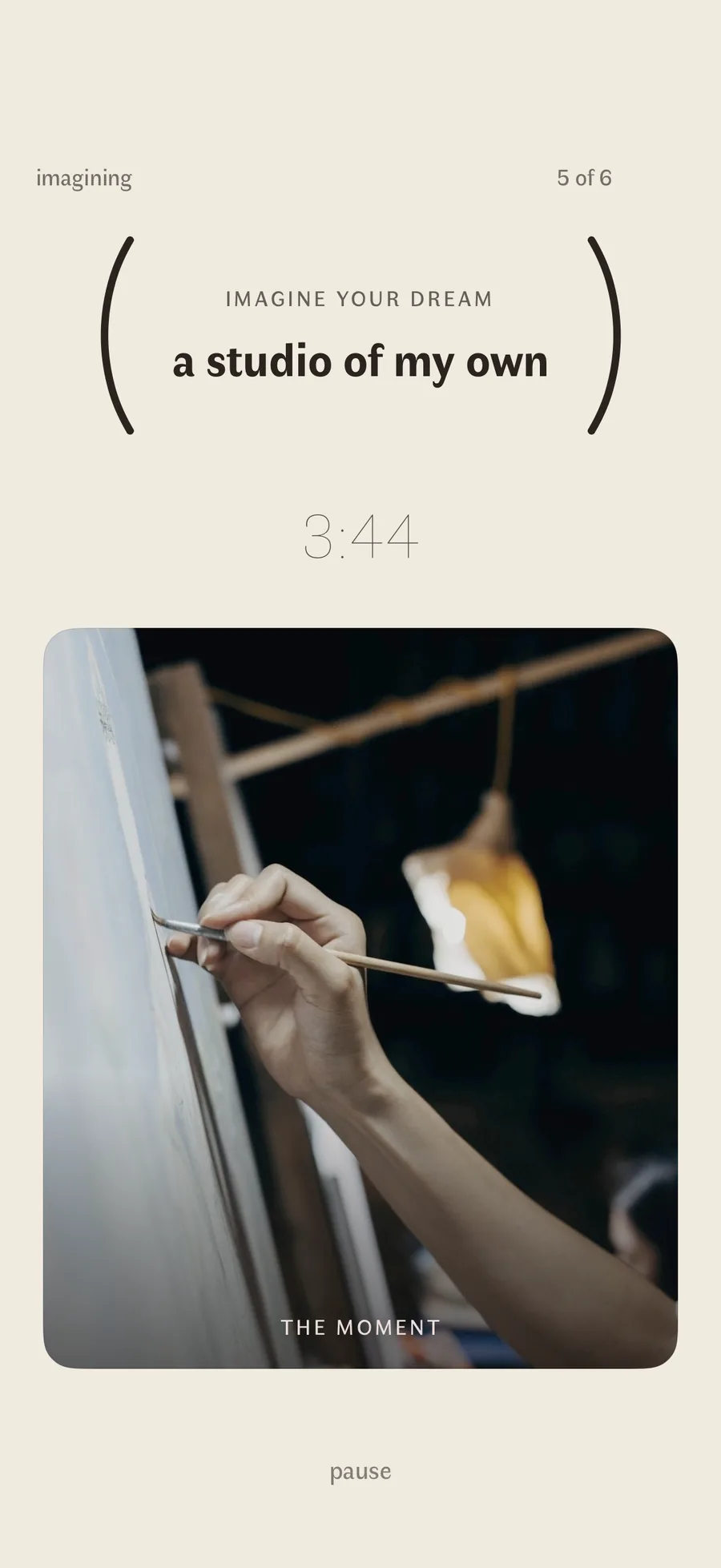 A session running: the dream's name between two arcs, the time left, and the fifth of six photographs below it, a hand at the canvas, captioned the moment