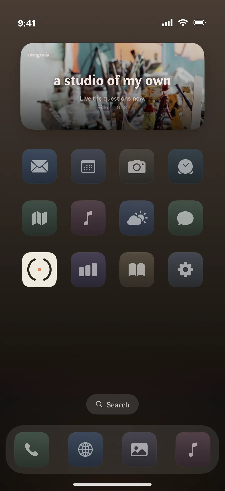 The Imagoria widget on a home screen: the dream of the day over one of your own photographs, with a quiet line under it